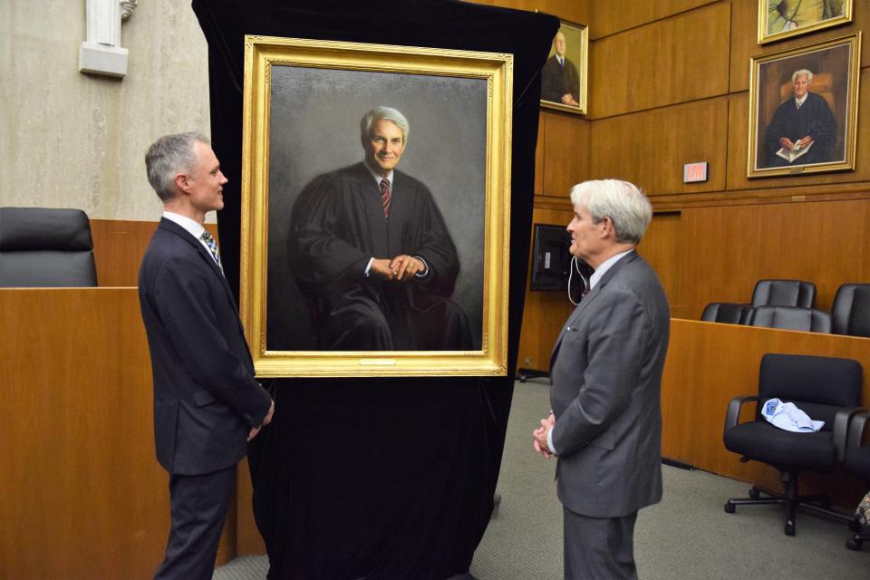 Thomas Griffith with portrait artist Jonathan Linton. | Ann Wilkins