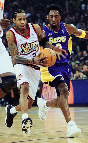 <p>JOHN G. MABANGLO/AFP via Getty </p> Allen Iverson and Kobe Bryant