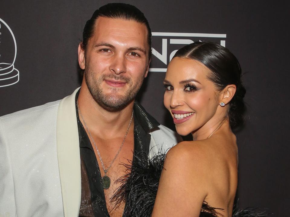 Scheana Marie (R) and her Husband Brock Davies (L) attend Stephen Lovegrove's First Noelle Ball 2022 at The Mayan on December 08, 2022 in Los Angeles, California