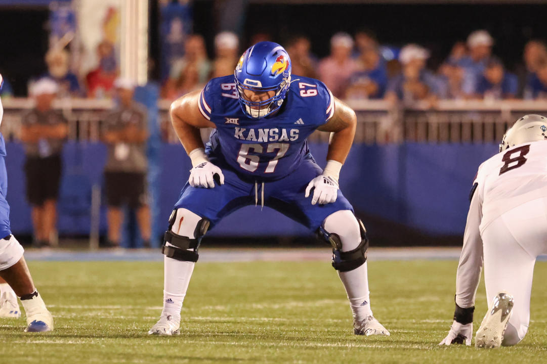 LAWRENCE, KS - SEPTEMBER 01: Kansas Jayhawks offensive lineman Dominick Puni (67) before the snap in the second half of a college football game between the Missouri State Bears and Kansas Jayhawks on Sep 1, 2023 at David Booth Memorial Stadium in Lawrence, KS. (Photo by Scott Winters/Icon Sportswire via Getty Images)