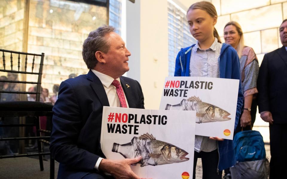 Australian mining billionaire and environmental evangelist Andrew Forrest, left, pictured with climate activist Greta Thunberg in 2019 - AP Photo/Mary Altaffer