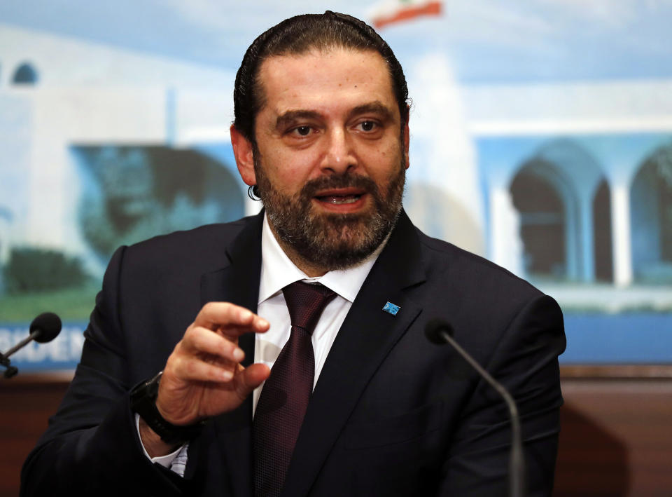 Newly-assigned Lebanese Prime Minister Saad Hariri, speaks to journalists at the presidential palace in Baabda, east of Beirut, Lebanon, Thursday, Jan. 31, 2019. Lebanese political factions have agreed on the formation of a new government, breaking a nine-month deadlock that only deepened the country' economic woes. (AP Photo/Hussein Malla)