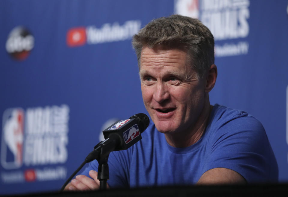 Golden State Warriors head coach Steve Kerr takes questions at a press conference before the basketball team’s practiced during the NBA Finals, Thursday, June 7, 2018, in Cleveland. The Warriors lead the series 3-0 with Game 4 on Friday. (AP Photo/Carlos Osorio)