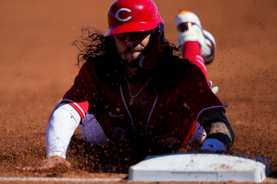 Cincinnati Reds second baseman Jonathan India (6) steals third base in the first inning of the MLB Cactus League spring training game between the Cincinnati Reds and the Cleveland Guardians at Goodyear Ballpark in Goodyear, Ariz., on Saturday, Feb. 25, 2023.