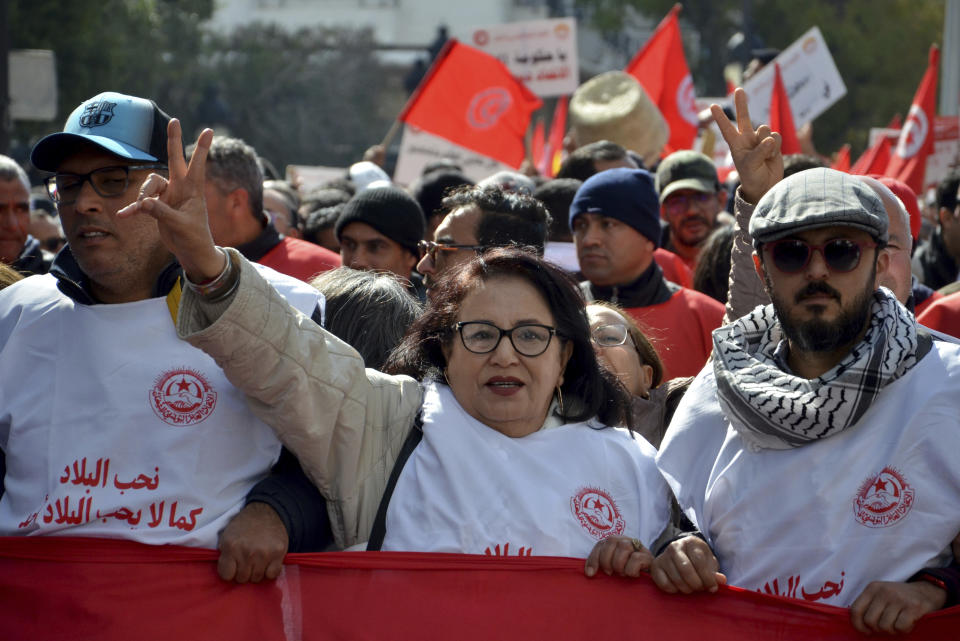 Members of the Tunisian General Labor Union (UGTT) take part in a protest against president Kais Saied policies, in Tunis, Tunisia, Saturday, March 4, 2023. (AP Photo/Hassene Dridi)