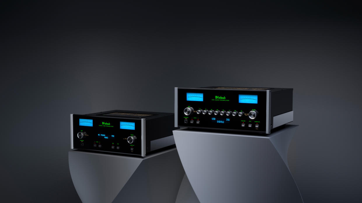  McIntosh C55 and McIntosh C2800 side by side on plinths. 