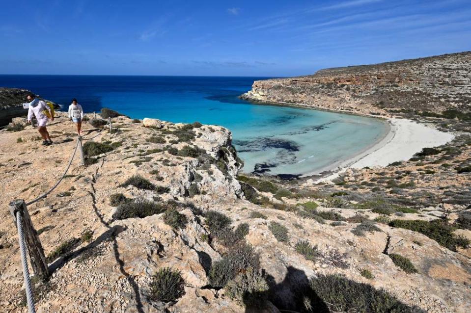 “Unbelievably blue waters and white sand set the scene at Spiaggia dei Conigli,” Tripadvisor wrote. AFP via Getty Images