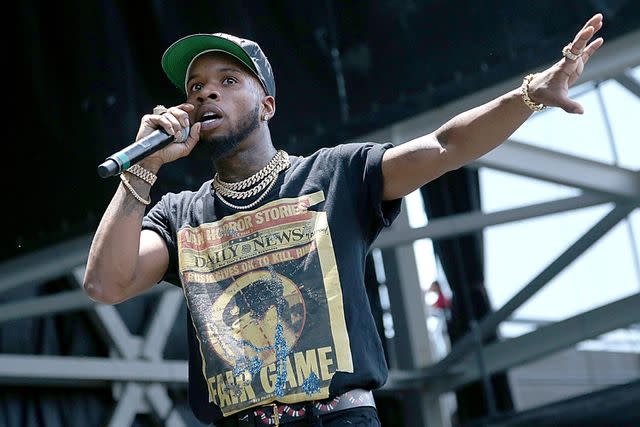 <p>Gary Miller/Getty</p> Tory Lanez performs in concert during the Future Hndrxx tour at Austin360 Amphitheater on June 23, 2017 in Austin, Texas