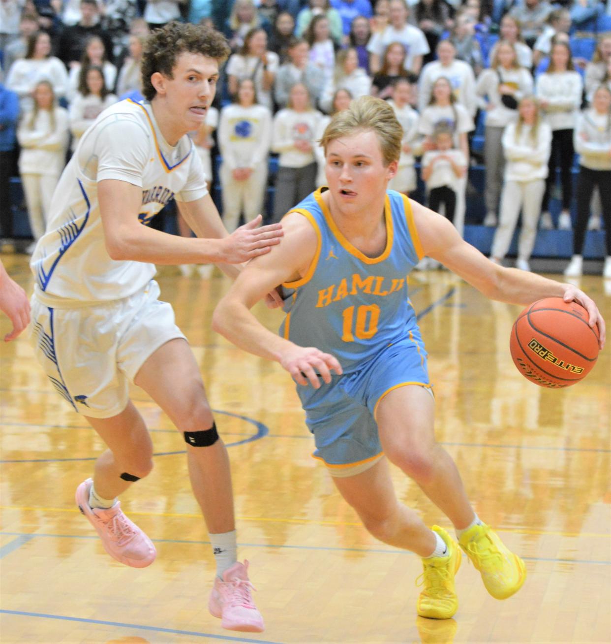 Hamlin's Evan Stormo dribbles past Castlewood's Luke Baumberger during their high school boys basketball game on Monday, Jan. 29, 2024 in Castlewood. No. 2 Class A Hamlin beat No. 3 Class B Castlewood 71-47.