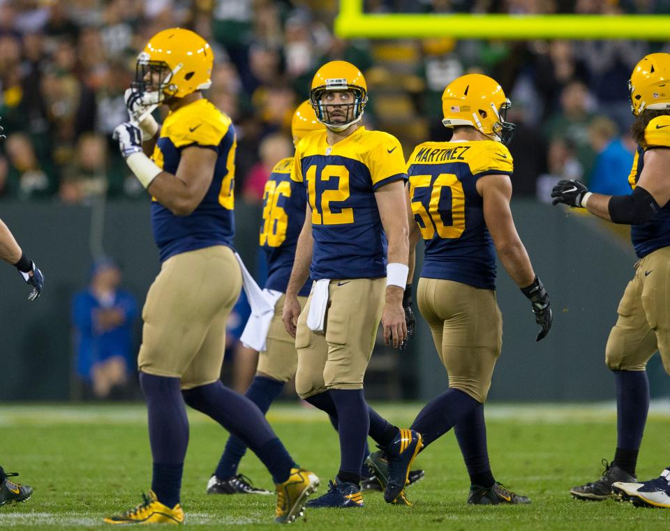 Green Bay Packers quarterback Aaron Rodgers (12) looks to the scoreboard following a turnover during the fourth quarter against the Dallas Cowboys at Lambeau Field on Oct 16, 2016.