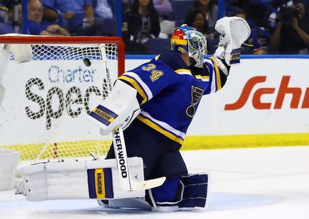 May 23, 2016; St. Louis, MO, USA; St. Louis Blues goalie Jake Allen (34) allows a goal scored by San Jose Sharks center Joe Pavelski (not pictured) in game five of the Western Conference Final of the 2016 Stanley Cup Playoffs at Scottrade Center. Mandatory Credit: Billy Hurst-USA TODAY Sports