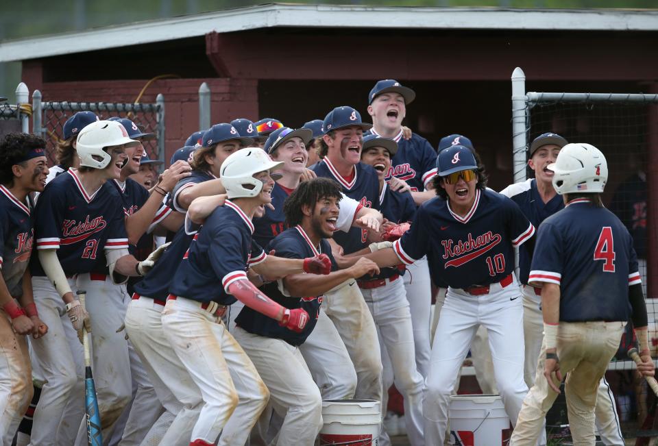 Roy C. Ketcham's baseball team celebrate as Connor Lynch makes it home on an RBI during the Section 1 Class AA baseball semifinal versus Arlington on May 23, 2022. 