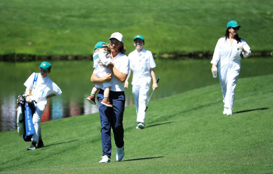 AUGUSTA, GEORGIA - APRIL 10: Tommy Fleetwood of England walks with his family during the Par 3 Contest prior to the Masters at Augusta National Golf Club on April 10, 2019 in Augusta, Georgia. (Photo by Andrew Redington/Getty Images)