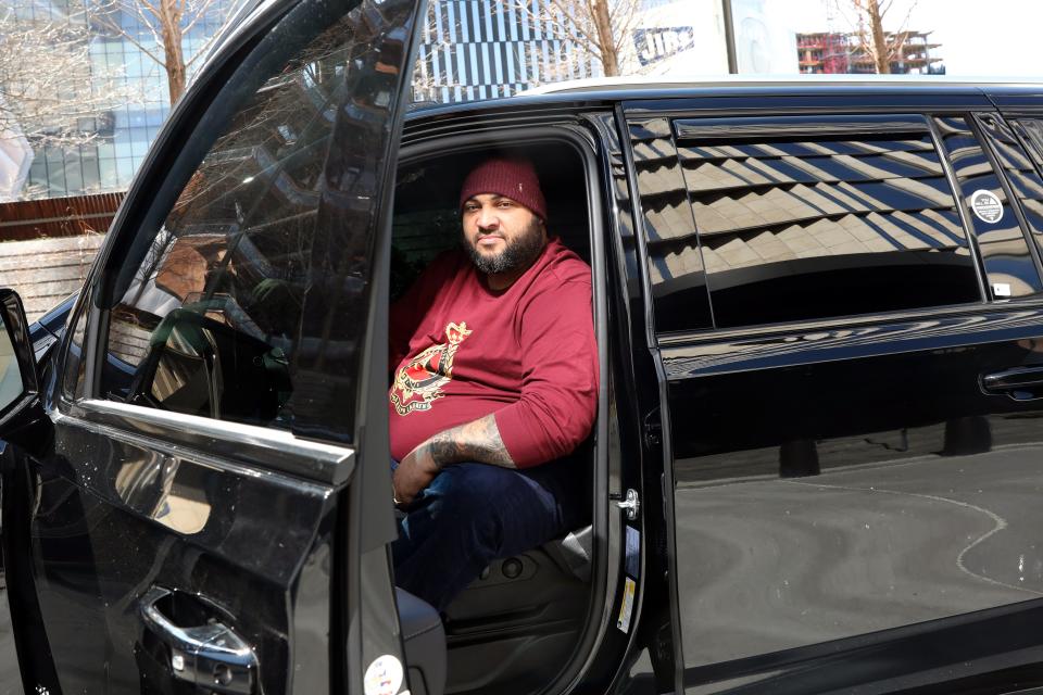 Ivan Ventura, a New York City For-Hire Vehicle driver, at Hudson Yards between rides March 11, 2022 in Manhattan. With the recent hike in gas prices, Ventura said he has been finding gas station promotions to save money.