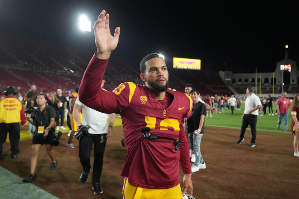 Sept. 9, 2023; Los Angeles, California; Southern California Trojans quarterback <a class="link " href="https://sports.yahoo.com/ncaaf/players/336072" data-i13n="sec:content-canvas;subsec:anchor_text;elm:context_link" data-ylk="slk:Caleb Williams;sec:content-canvas;subsec:anchor_text;elm:context_link;itc:0">Caleb Williams</a> (13) gestures after the game against the Stanford Cardinal at United Airlines Field at Los Angeles Memorial Coliseum. Kirby Lee-USA TODAY Sports