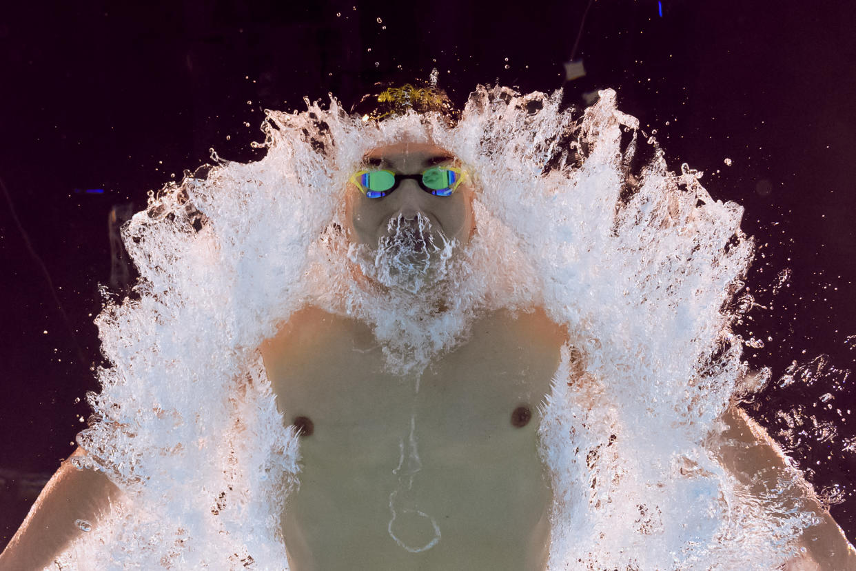 Hungary's Kristof Milak compete in a heat in the 200m butterfly. (Photo by Oli SCARFF /AFP)