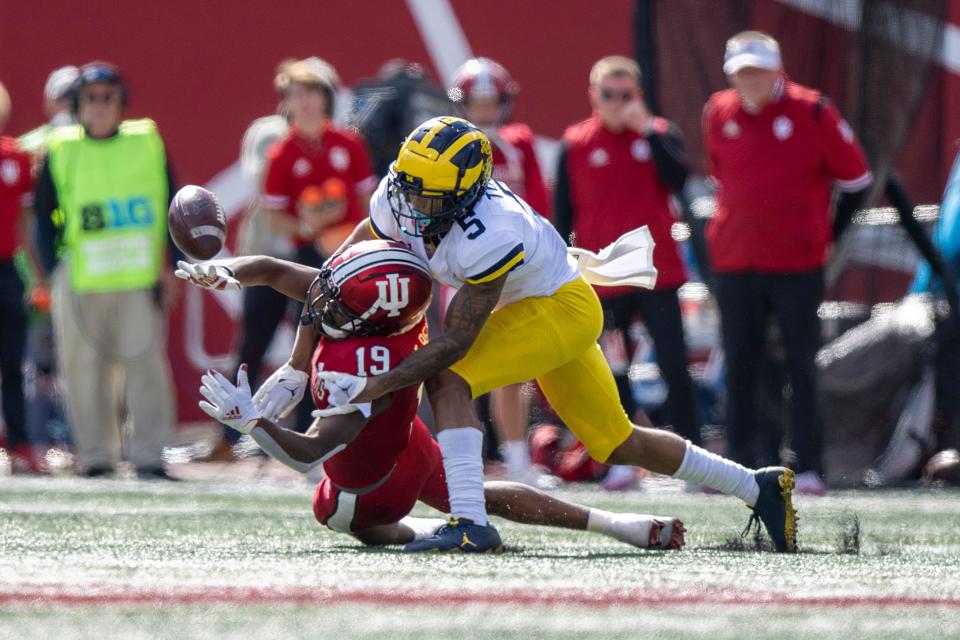 Indiana Hoosiers wide receiver Malachi Holt-Bennett (19) misses a pass under coverage from Michigan Wolverines defensive back DJ Turner (5) during the second half Oct. 8, 2022 at Memorial Stadium. Wolverines won 31-10.