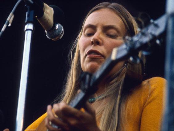 Bongo interruption: Joni Mitchell performing at the Isle of Wight Festival in 1970 (Rex)