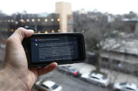 FILE - A ChatGPT prompt is shown on a device near a public school in Brooklyn, New York, Thursday, Jan. 5, 2023. The latest folding smartphones, immersive metaverse experiences, AI-powered chatbot avatars and other eye-catching technology are set to wow visitors at the annual MWC wireless trade fair. The four-day show, also known as Mobile World Congress, kicks off Monday in a vast Barcelona conference center. It's the world’s biggest and most influential meeting for the mobile tech industry. (AP Photo/Peter Morgan, File)