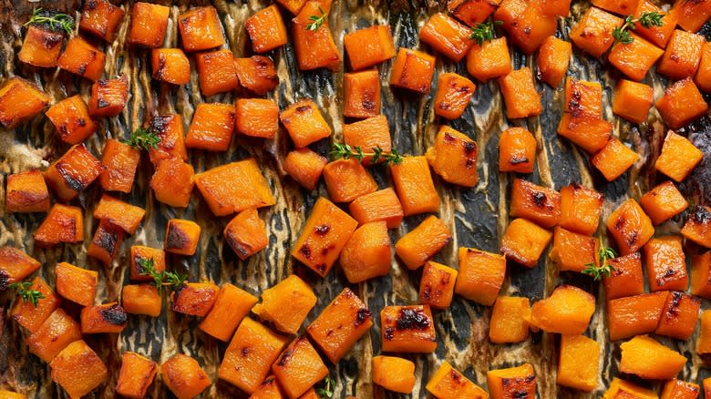 cubed roasted squash on pan 