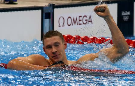 2016 Rio Olympics - Swimming - Final - Men's 100m Backstroke Final - Olympic Aquatics Stadium - Rio de Janeiro, Brazil - 08/08/2016. Ryan Murphy (USA) of USA celebrates. REUTERS/David Gray