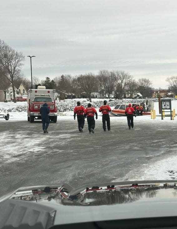 The U.S. Coast Guard, out of the Marblehead station, return from the rescue of ice fishermen on Monday.