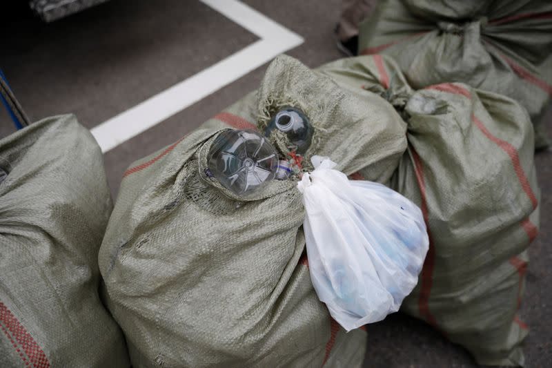 North Korean defector group prepares plastic bottles filled with rice and masks to be sent towards North Korea