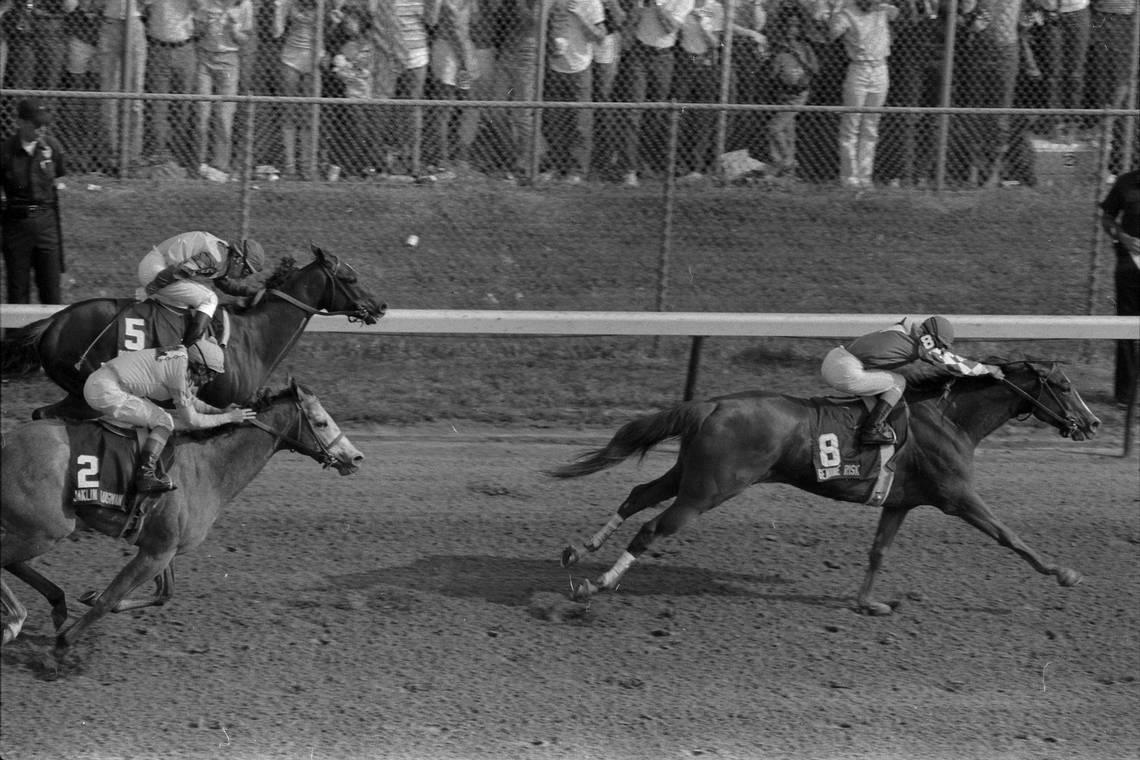 Filly Genuine Risk, with Jacinto Vasquez up, pulls away to win the 106th running of the Kentucky Derby in 1980. Christy Porter/Herald-Leader file photo