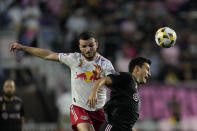 New York Red Bulls defender Thomas Edwards, left, clashes with Inter Miami forward Robbie Robinson during the first half of an MLS soccer match Friday, Sept. 17, 2021, in Fort Lauderdale, Fla. (AP Photo/Rebecca Blackwell)