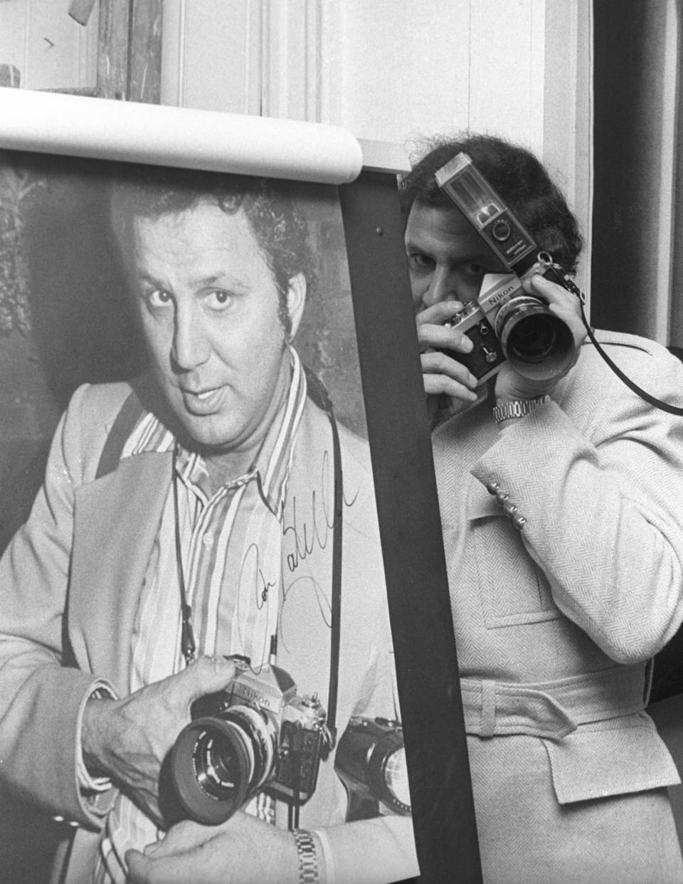 <div class="inline-image__caption"><p>Photographer Ron Galella attends Photo Exhibit on April 20, 1975 at Salon de Refuses in New York City. </p></div> <div class="inline-image__credit">Ron Galella / Ron Galella Collection / Getty</div>
