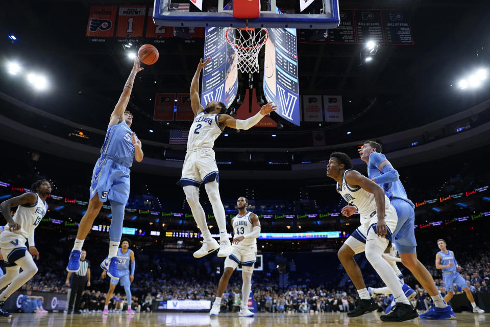 Creighton's Francisco Farabello (5) goes up for a shot against Villanova's Mark Armstrong (2) during the first half of an NCAA college basketball game, Saturday, March 9, 2024, in Philadelphia. (AP Photo/Matt Slocum)