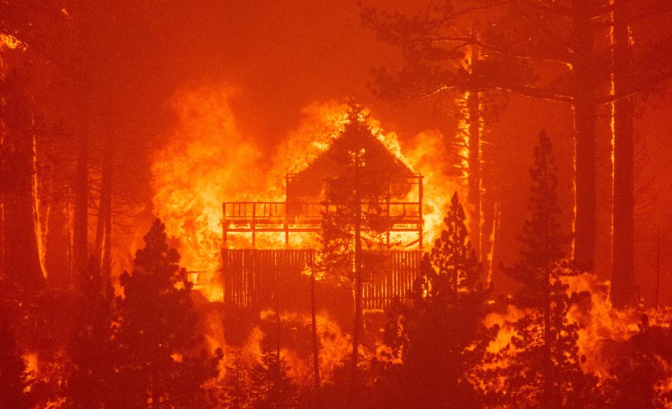 Flames consume multiple homes