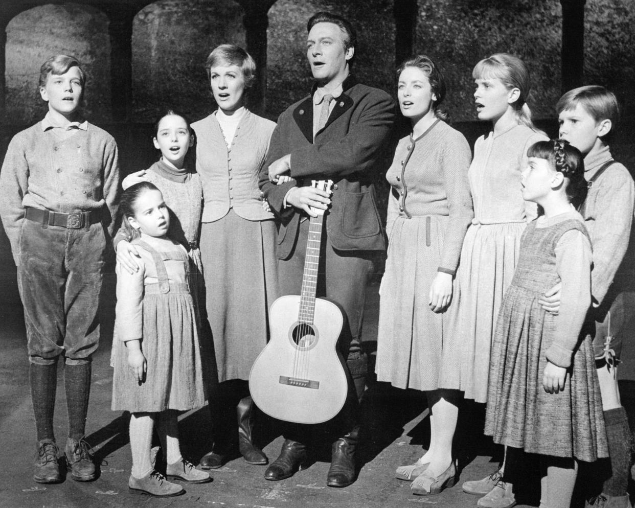 The actors playing members of the Von Trapp family in a promotional portrait for 'The Sound Of Music', directed by Robert Wise, 1965. Left to right: Nicholas Hammond as Friedrich, Kym Karath as Gretl, Angela Cartwright as Brigitta, Julie Andrews as Maria, Christopher Plummer as Captain Von Trapp, Charmian Carr as Liesl, Heather Menzies as Louisa, Debbie Turner as Marta and Duane Chase as Kurt. (Photo by Silver Screen Collection/Getty Images)
