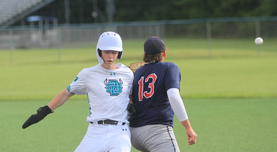 Utica's Roman Gamble returns to first base for the Ohio Bison 17U/18U following a catch in the outfield in a 5-4 victory over the Dayton Sluggers 17U on Friday.
