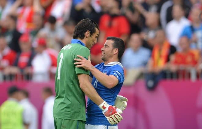 Italian goalkeeper Gianluigi Buffon (L) reacts with Italian forward Antonio Di Natale at the end of the Euro 2012 championships football match Spain vs Italy on June 10, 2012 at the Gdansk Arena. AFPPHOTO/ GIUSEPPE CACACEGIUSEPPE CACACE/AFP/GettyImages