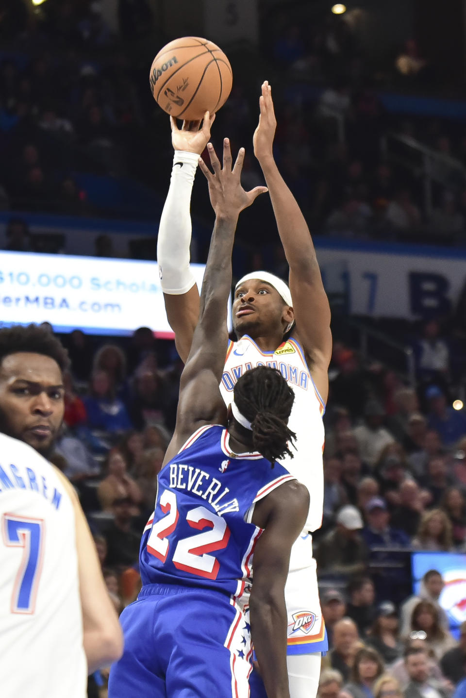 Oklahoma City Thunder guard Shai Gilgeous-Alexander shoots the ball over Philadelphia 76ers guard Patrick Beverley during the second half of an NBA basketball game Saturday, Nov. 25, 2023, in Oklahoma City. (AP Photo/Kyle Phillips)