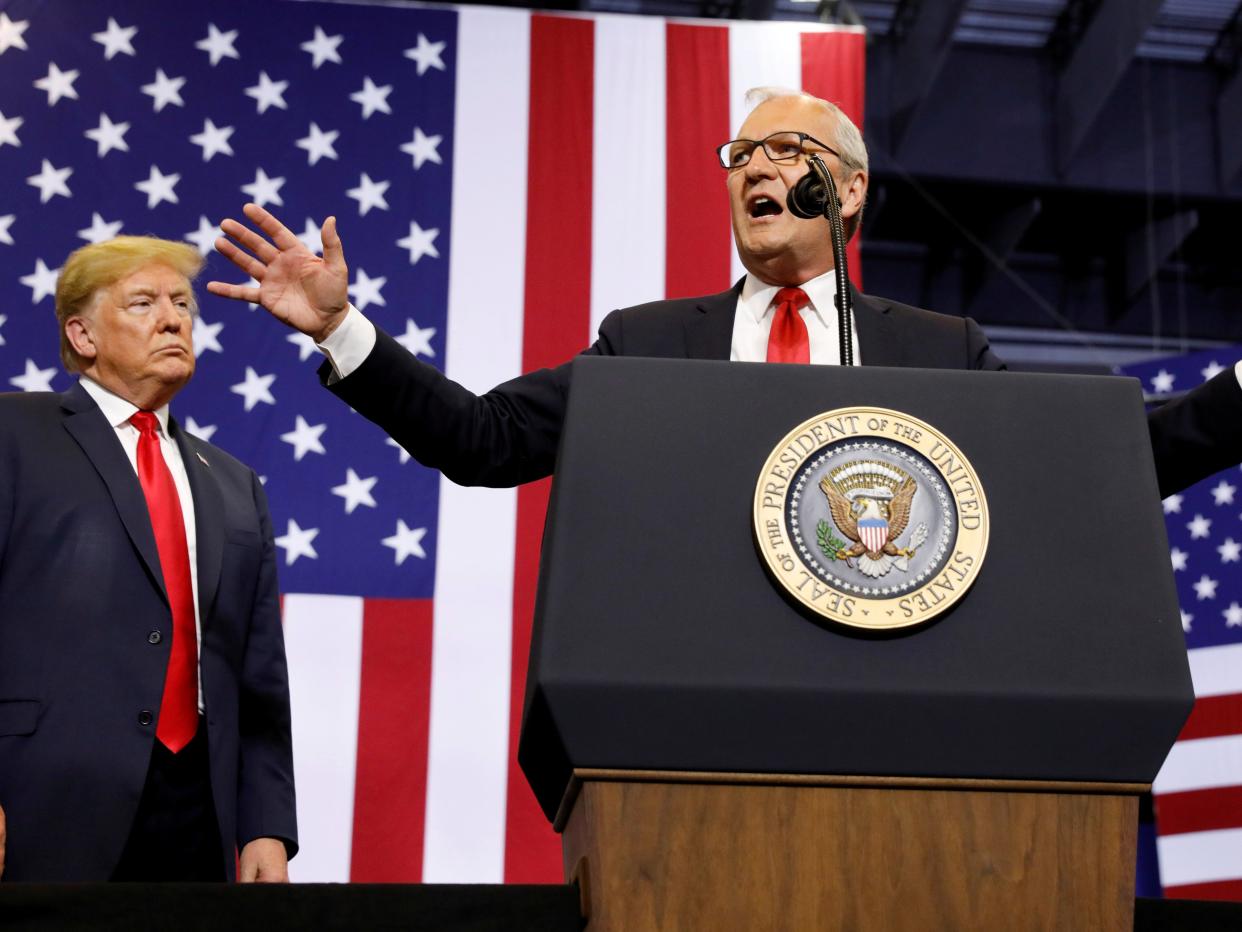 President Donald Trump listens at a rally in support of representative Kevin Cramer in his run for Senate in Fargo, North Dakota on 27 June 2018 ((Reuters))