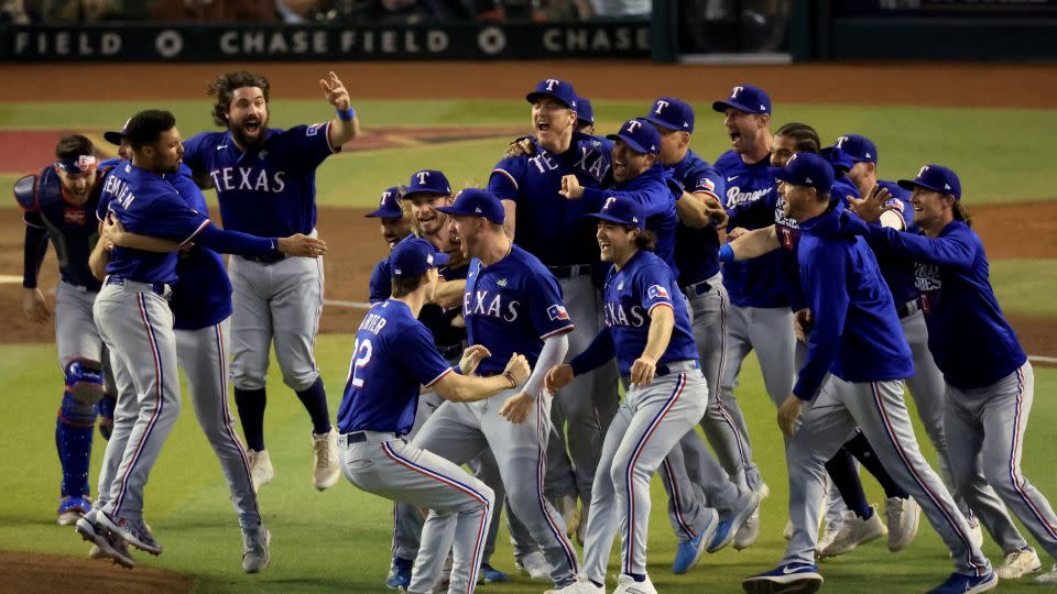 The Rangers celebrate after taking Game Five on the road at Chase Field. - Sean M. Haffey/Getty Images