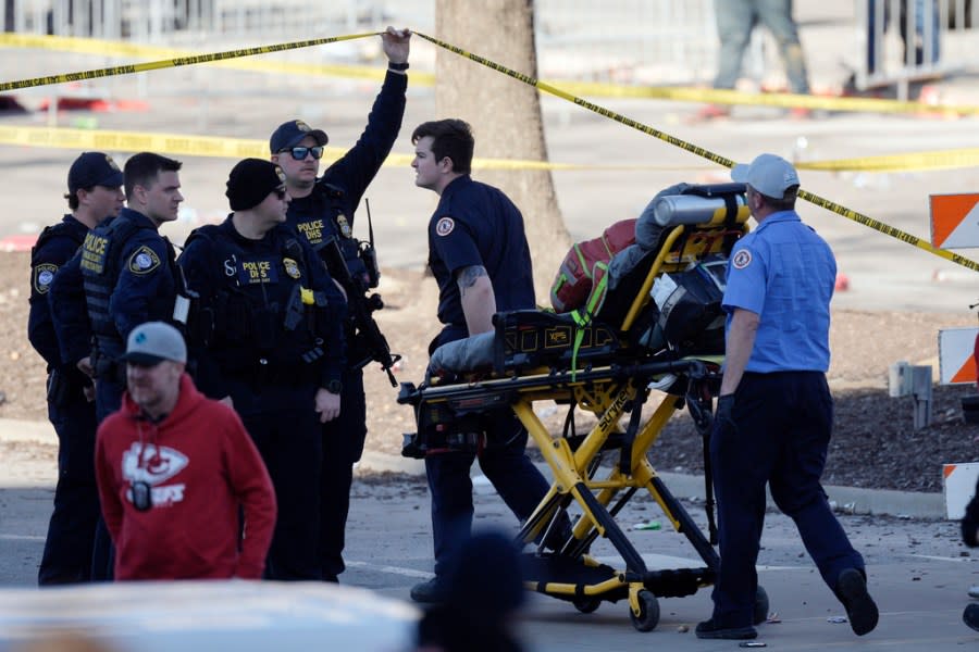 Emergency personnel arrive following a shooting at the Kansas City Chiefs NFL football Super Bowl celebration in Kansas City, Mo., Wednesday, Feb. 14, 2024. Multiple people were injured, a fire official said. (AP Photo/Charlie Riedel)