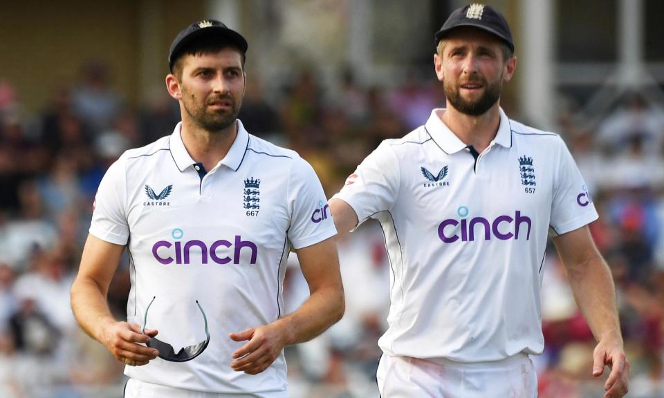 <span>Mark Wood (left) was forced off after the first ball of his 15th over on day two.</span><span>Photograph: Rui Vieira/AP</span>