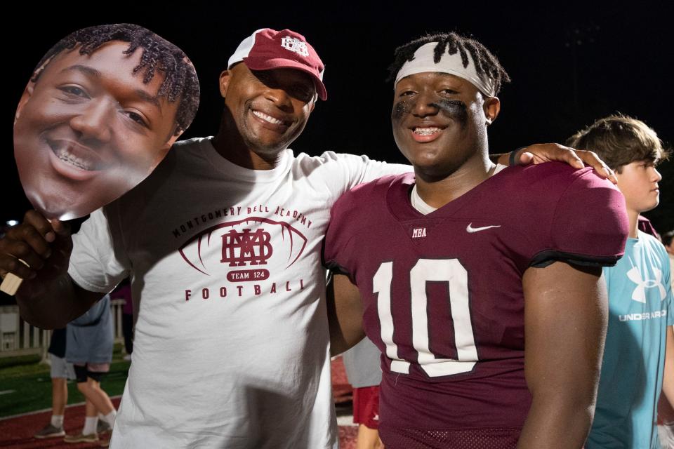 TSU football coach and former Titans running back Eddie George celebrates with his son, MBA defensive lineman Eriq George, after a 2022 victory vs. Pearl-Cohn.