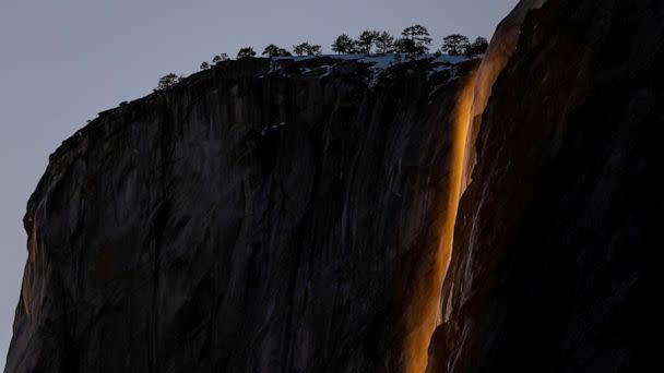 PHOTO: Horsetail Fall at El Capitan is seen during sunset in Yosemite National Park, Calif., Feb. 15, 2023. (Carlos Barria/Reuters)