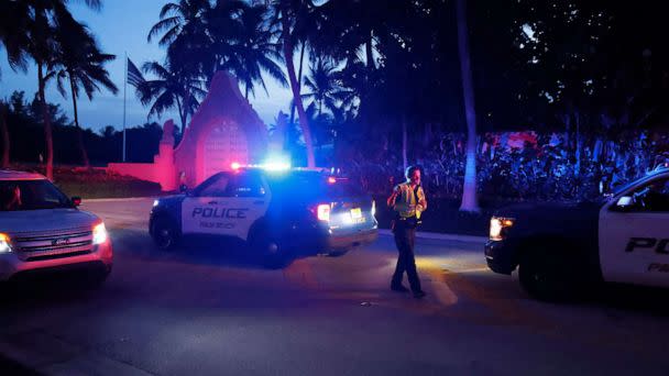 PHOTO: Police direct traffic outside an entrance to former President Donald Trump's Mar-a-Lago estate, Aug. 8, 2022, in Palm Beach, Fla (Terry Renna/AP)