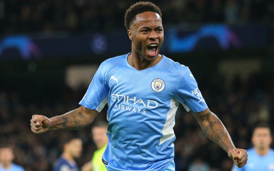 Raheem Sterling of Manchester City celebrates scoring his teams first goal during the UEFA Champions League group A match between Manchester City and Paris Saint-Germain - James Gill - Danehouse/Getty Images