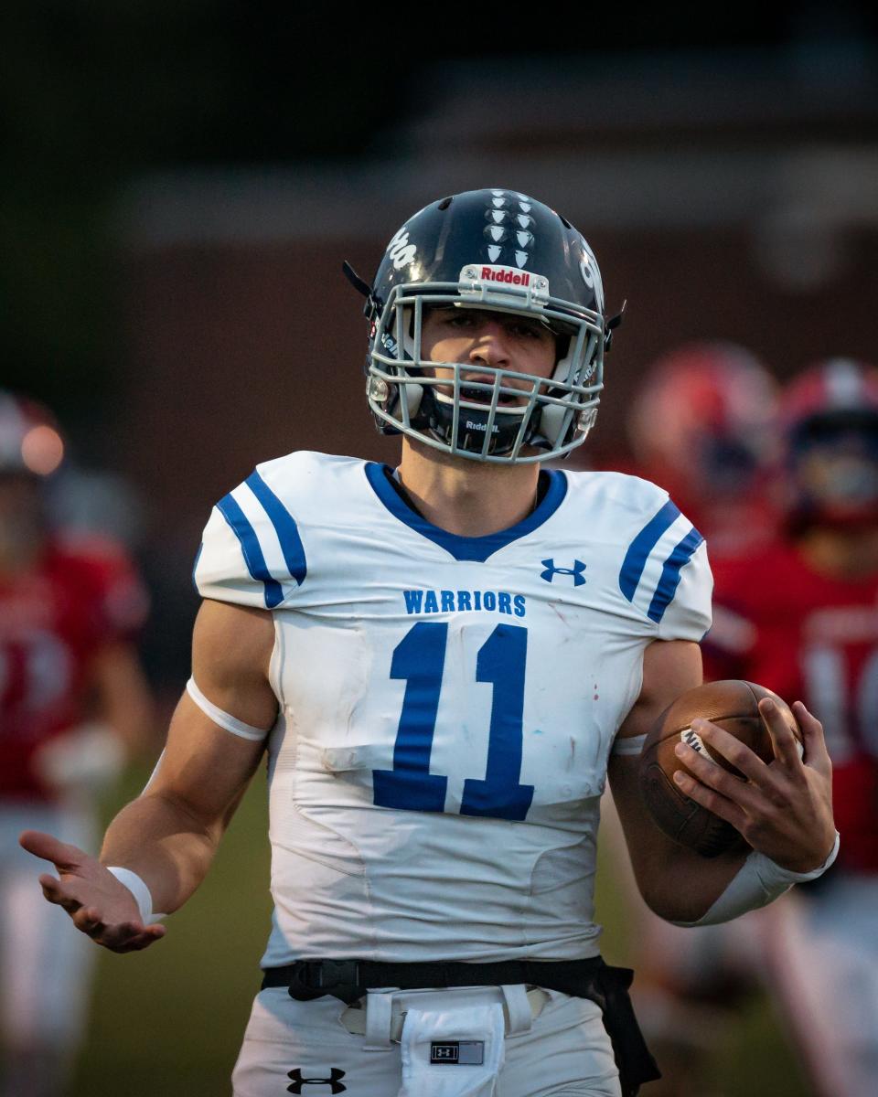 Whitesboro's Kyle Meier evades New Hartford's defense and scores a touchdown at Don Edick Field in New Hartford on Friday, September 30, 2022. Whitesboro went on to win 38-19.