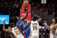 Jan 21, 2019; Atlanta, GA, USA; Orlando Magic forward Jarell Martin (2) tries to get a rebound between Atlanta Hawks forward DeAndre' Bembry (95) and center Dewayne Dedmon (14) during the second half at State Farm Arena. Mandatory Credit: Dale Zanine-USA TODAY Sports