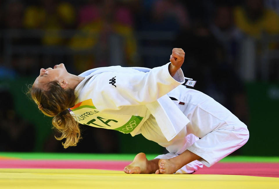 <p>Odette Giuffrida of Italy celebrates after defeating Yingnan Ma of China during the Womens -52kg semi final on Day 2 of the Rio 2016 Olympic Games at Carioca Arena 2 on August 7, 2016 in Rio de Janeiro, Brazil. (Photo by Laurence Griffiths/Getty Images) </p>