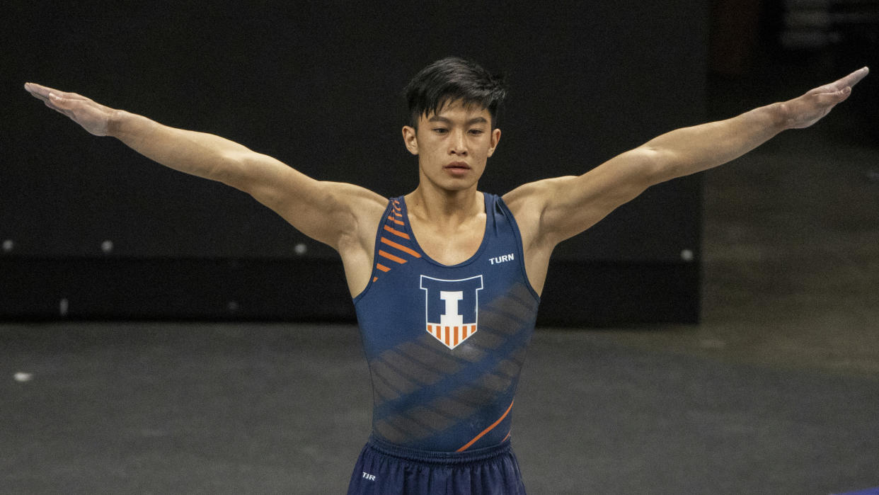 Illinois' Evan Manivong during an NCAA gymnastics meets on Saturday, Feb. 13, 2021, in Iowa City, Iowa. (AP Photo/Justin Hayworth)