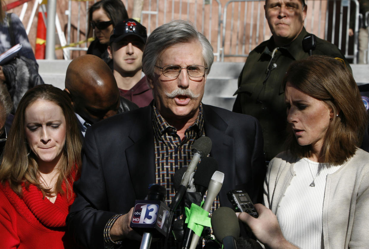 Fred Goldman, father of Ron Goldman, speaks to reporters as Lauren Luebker, left, and Kim Goldman, right, Ron Goldman's sister, listen on Dec. 5, 2008, in Las Vegas after O.J. Simpson was sentenced on charges including felony kidnapping, armed robbery and conspiracy related to a 2007 confrontation with sports memorabilia dealers. / Credit: Pool / Getty Images