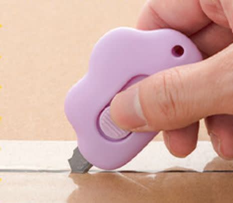 A cloud-shaped utility knife to help you cut open packages